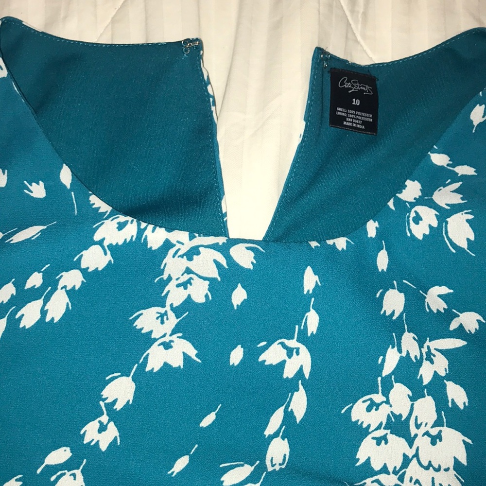 Knee length printed dress with shoulder cut outs